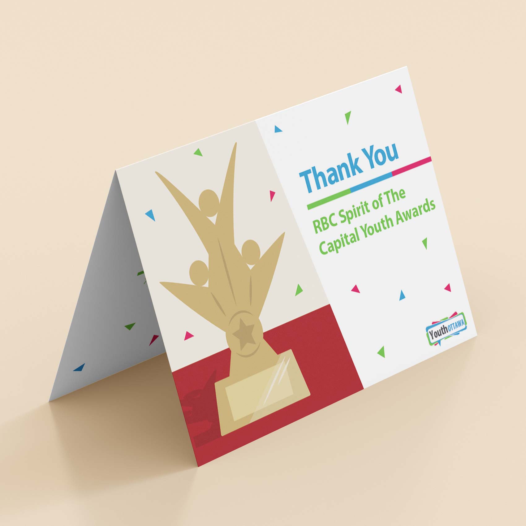 This is a picture of a thank you card that I designed for the Youth Ottawa spirit of the capital awards. There's an illustration on the front of the award they give out at this event.